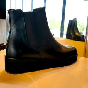 Black leather flat ankle boot